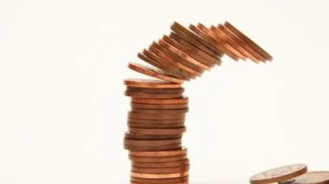 Pennies falling over